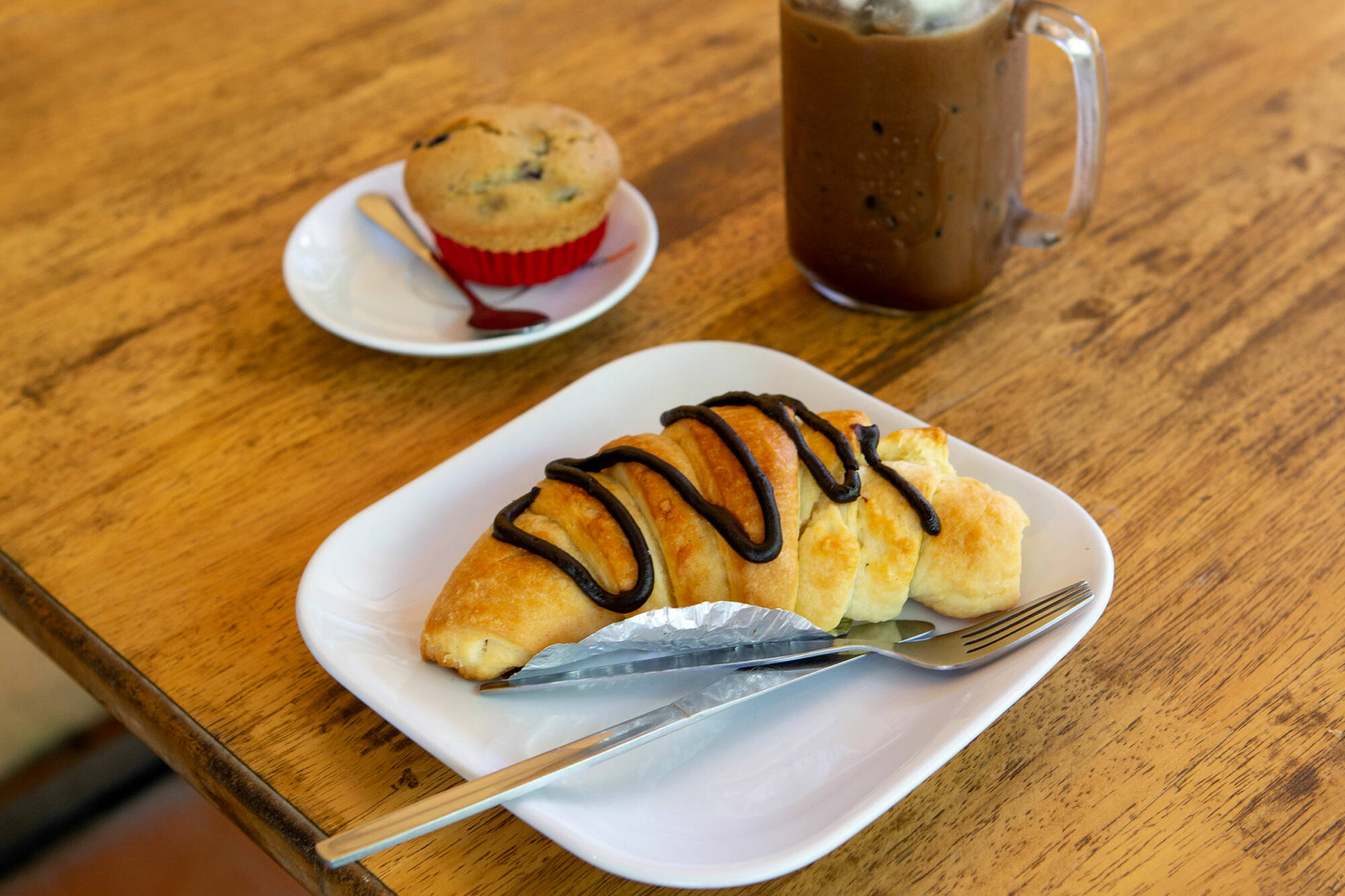 Chocolate croissant served to your table