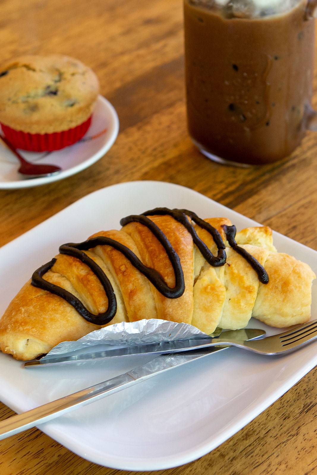 Chocolate croissant served to your table