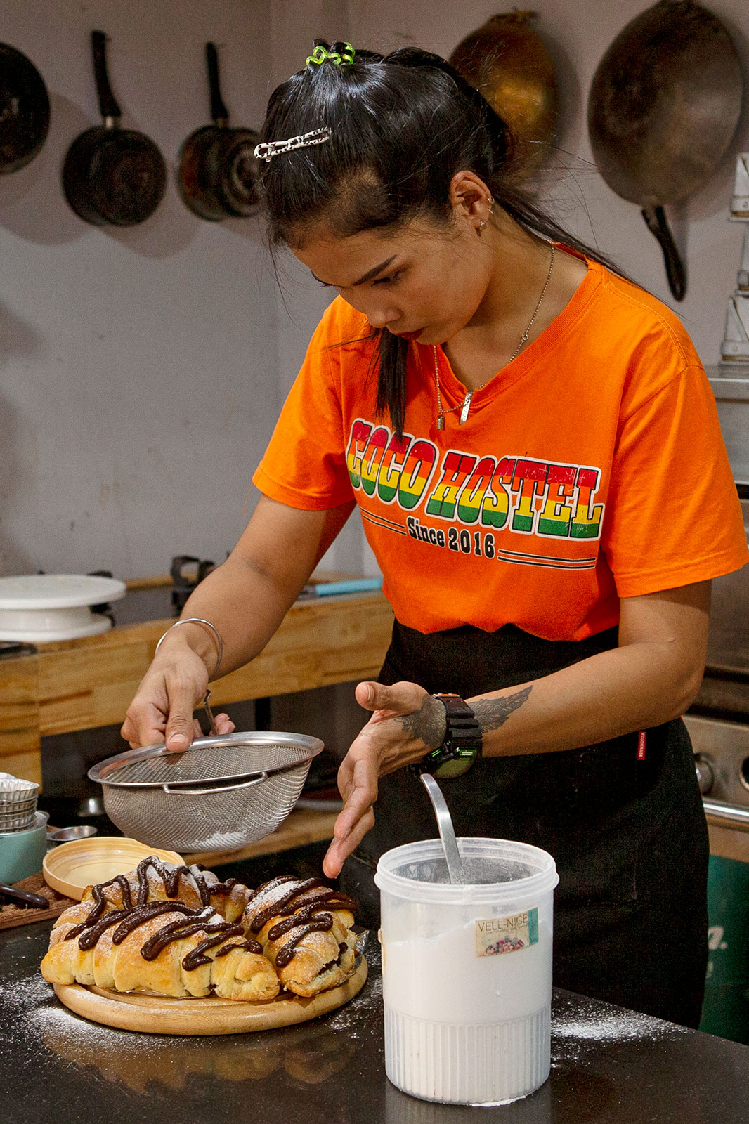 Khao Sok bakery - topping off the chocolate croissants